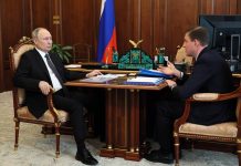 Владимир Путин и Андрей Турчак. Фото пресс-службы ХРО ЕР