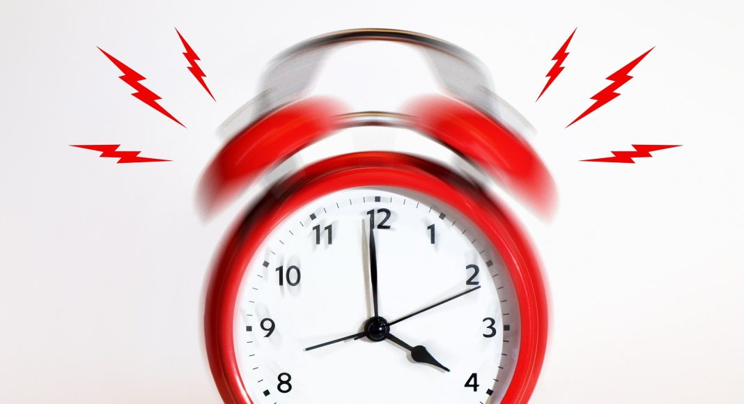 Звонок. Будильник. Изображение из фотобанка