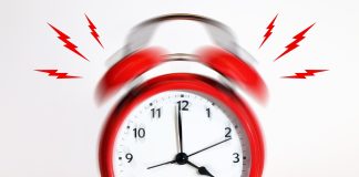 Звонок. Будильник. Изображение из фотобанка