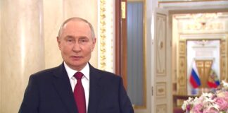 Путин поздравил женщин с 8 Марта Владимир Путин. Кадр съемки пресс-службы Кремля