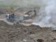 Остатки очага пожара на Черногорском полигоне засыпают грунтом Фото из телеграм-канала Дмитрия Бученика